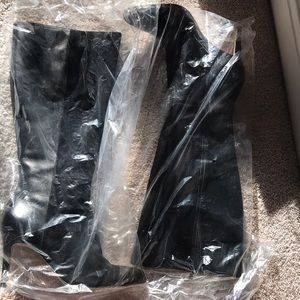 Black leather and suede boots